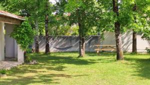 Maison à 8 min à pied de la Plage avec jardin clos et ombragé