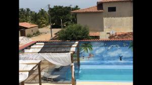 obrázek - Casa Temporada Frente à Praia Piscina Ar cond Nova Viçosa VA