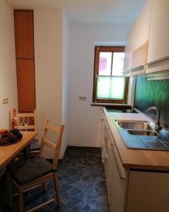 Alpenstyle Ferienwohnung mit Südbalkon in Geisteiers Hüs