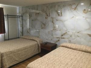 Double Room with Two Double Beds - Non-Smoking room in Americas Express Inn Rocky Mount