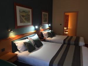 Hotels Hotel De La Paix : photos des chambres