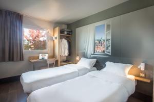 Hotels B&B HOTEL Douai Parc Des Expos Cuincy : photos des chambres