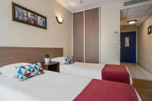 Appart'hotels Appart'City Classic Nimes : photos des chambres