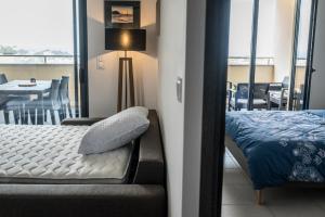 Appartements Superbe T2 climatise, proche plage - belle vue mer : photos des chambres