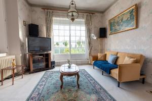 Appartements Maison Vintage de plain pied avec climatisation : photos des chambres