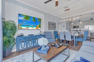 Top floor condo with view of lake, pool and fireworks! Next to Convention Center!