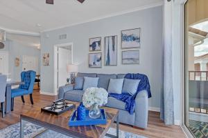 Top floor condo with view of lake, pool and fireworks! Next to Convention Center!