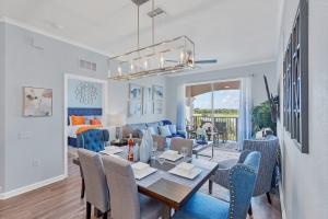 Top floor condo with view of lake, pool and fireworks! Next to Convention Center!