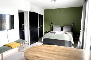 Appartements Mon Appart Hotel - Superbe Studio avec Parking Gratuit : photos des chambres