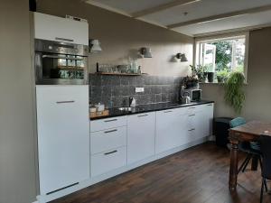 Appartement Voorhuis en chalet Klein Waterland