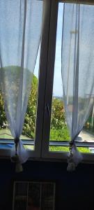 chambres bleues côté plage et aéroport climatisées et parking gratuit