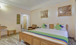 Treebo Komfort Suites, 3 Km From Mysore Palace