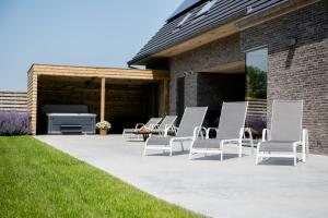 Coq au lit: Maison détoile