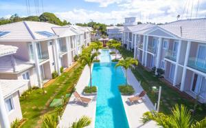 Apartamento em Arraial D`Ajuda com Piscina Sauna Academia