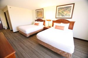 Queen Room with Two Queen Beds room in Crown Pointe Lodge; BW Signature Collection