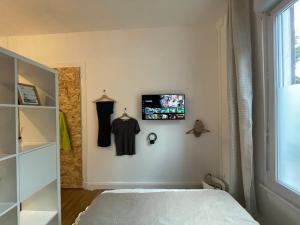 Appartements Magnifique studio design tout equipe : photos des chambres