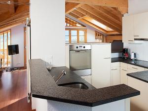 Apartment Chalet Tuffstein by Interhome