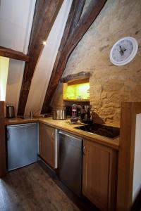 Appartements Le Grenier du Chapitre : photos des chambres