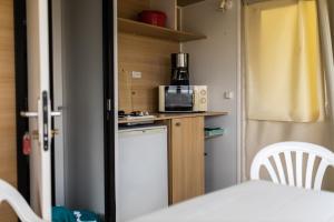 Campings Camping La Grappe Fleurie : photos des chambres