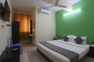 Green Tree Hotel-Near VFS Global and Ramee Mall