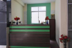 Green Tree Hotel-Near VFS Global and Ramee Mall