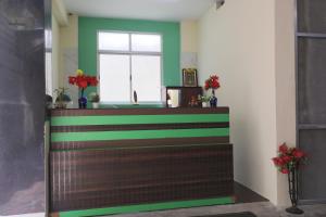 Green Tree Hotel-Near VFS Global and Ramee Mall
