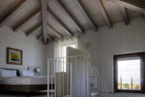 Deluxe Double or Twin Room with Balcony and Lake View room in Hotel Relais Agli Olivi