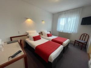 Hotels Le Cheval Blanc - Logis Hotel : photos des chambres