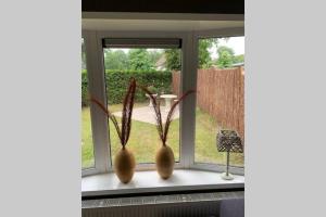 Ruim chalet op de Veluwe in Beekbergen op recreatiepark Topparken met vrije tuin en eigen parkeerplaats