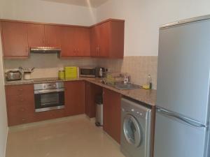 Stunning apartment C106 with balcony looking over pool