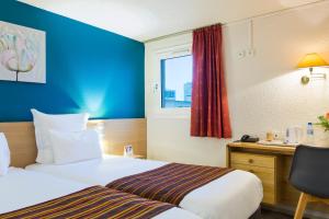 Hotels Comfort Hotel Montlucon : Chambre Lits Jumeaux Standard - Non-Fumeurs