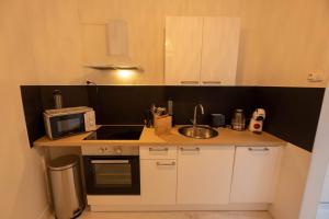 Appartements LE BALCON DE NOTRE DAME : photos des chambres