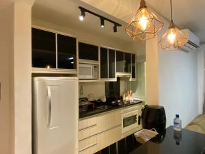 BETO CARREROApartamento 2Q300canaisPiscinaPraiaPlaygroundNautilus Home Club, com academia, na quadra do mar