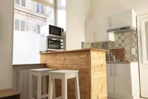 Appartements Studio cosy, hyper centre ville : photos des chambres