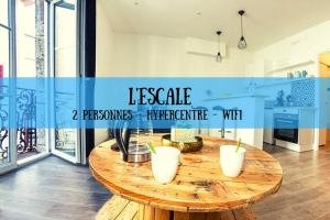 Appartements L'ESCALE - TOPDESTINATION-BOURG - Centre ville - Classe 3 etoiles : photos des chambres