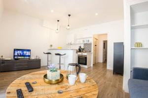 Appartements L'ESCALE - TOPDESTINATION-BOURG - Centre ville - Classe 3 etoiles : photos des chambres