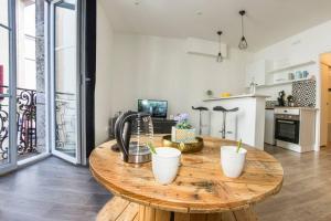 Appartements L'ESCALE - TOPDESTINATION-BOURG - Centre ville - Classe 3 etoiles : photos des chambres