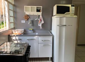 Unidade independente e confortável, em sobrado residencial no coração de Foz! TÉRREO e piscina compartilhada