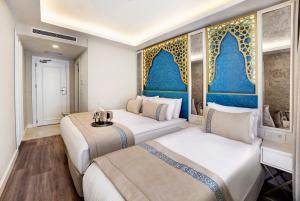 Standard Triple Room room in Great Fortune Design Hotel & Spa