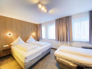 Triple Room room in Hotel Xenia Flensburg