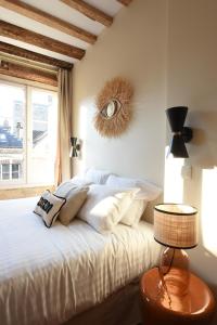 Appartements Les Nids Perches - Place Notre-Dame : photos des chambres