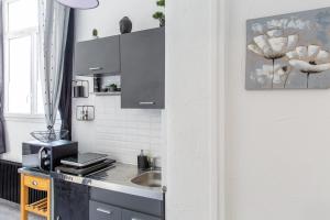 Appartements Studio en centre ville a 10 mn a pied de la gare : photos des chambres