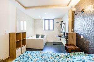 Appartements Superbe appartement avec balneo : photos des chambres