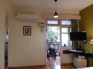 Palm Grove 1 Bhk Apartment at Candolim Beach with free Wifi