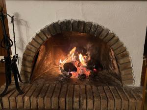 Dos chalets + 3 salones + calefacción + chimeneas (máx 21 personas)