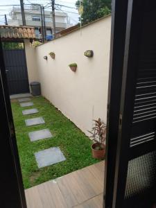 Kitinet para 2 pessoas próximo do mar - Ingleses - Com garagem