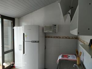Kitinet para 2 pessoas próximo do mar - Ingleses - Com garagem