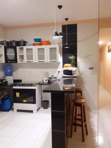 Casa com Ar e piscina no centro