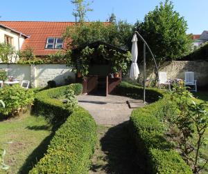 Zentrale Ferienwohnung mit Gartennutzung