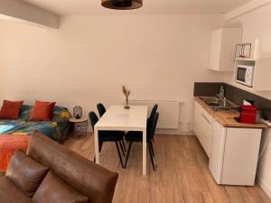 Appartements studio 2 RDC henriville : photos des chambres